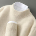 Jersey crema de cachemir con cuello alto para mujer